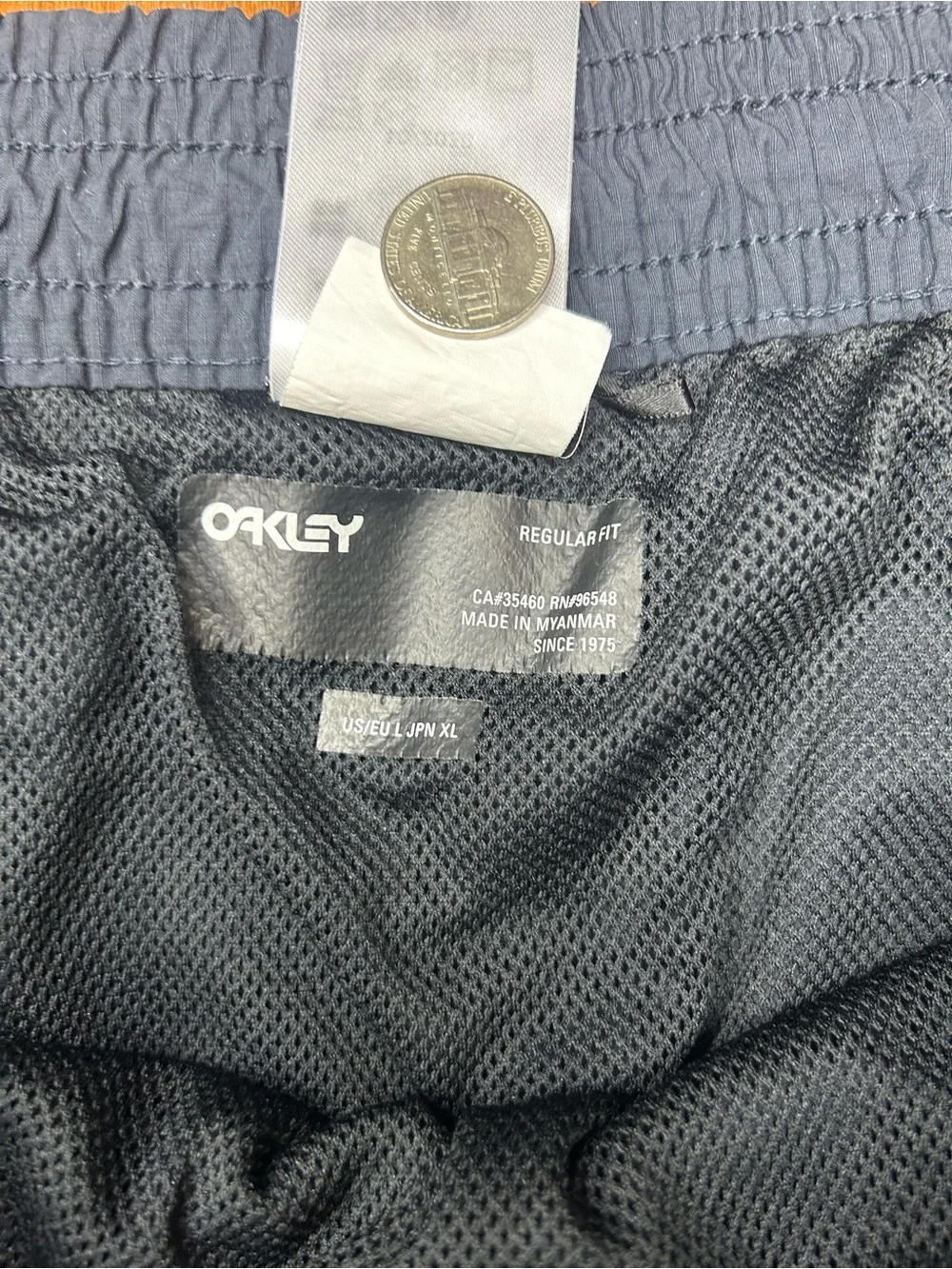 Oakley white pockets side